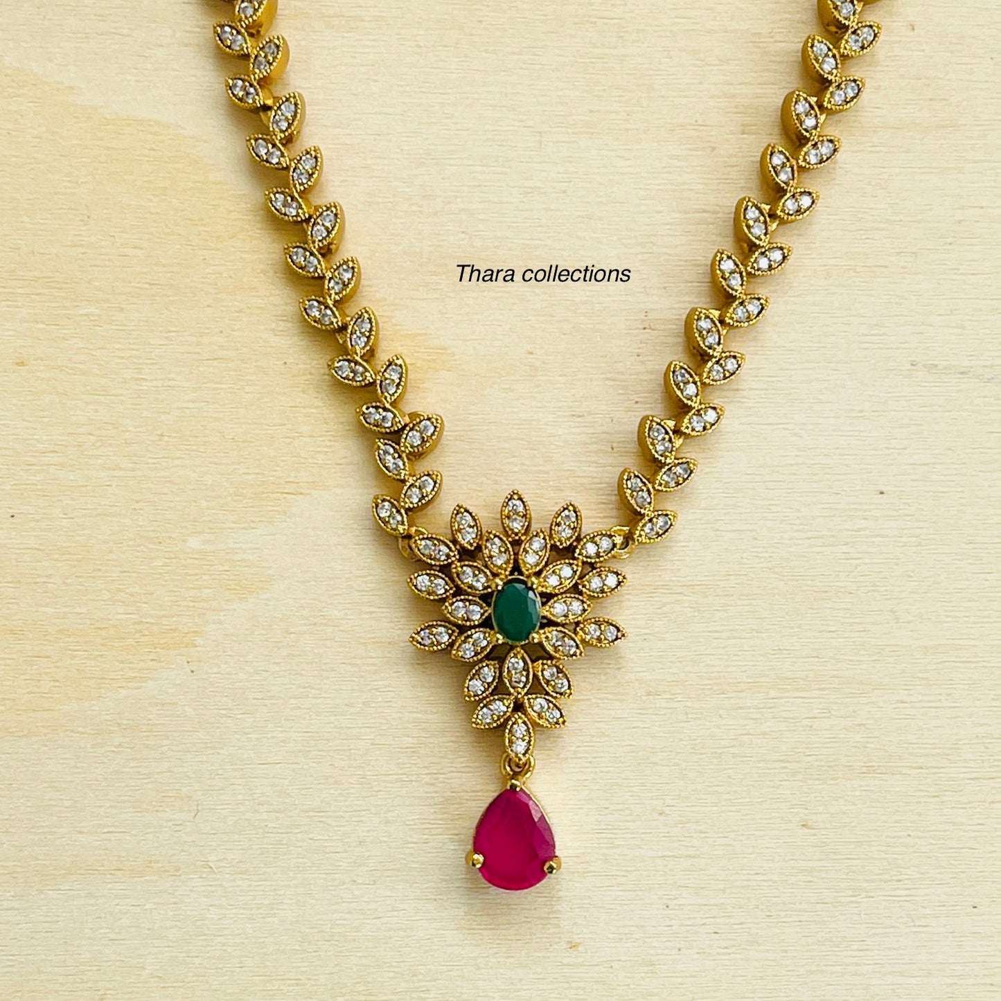 Classic Gold-Toned Necklace Set with Emerald & Ruby Accents