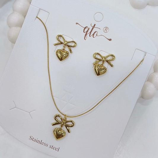 Bow with heart drop antitarnish pendant and earring combo set by Thara Collections TA130