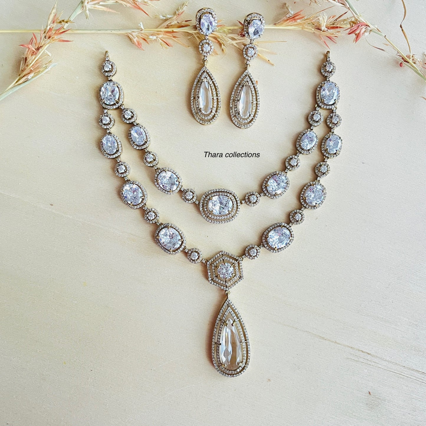 Elegant Crystal Layered Necklace & Earrings Set