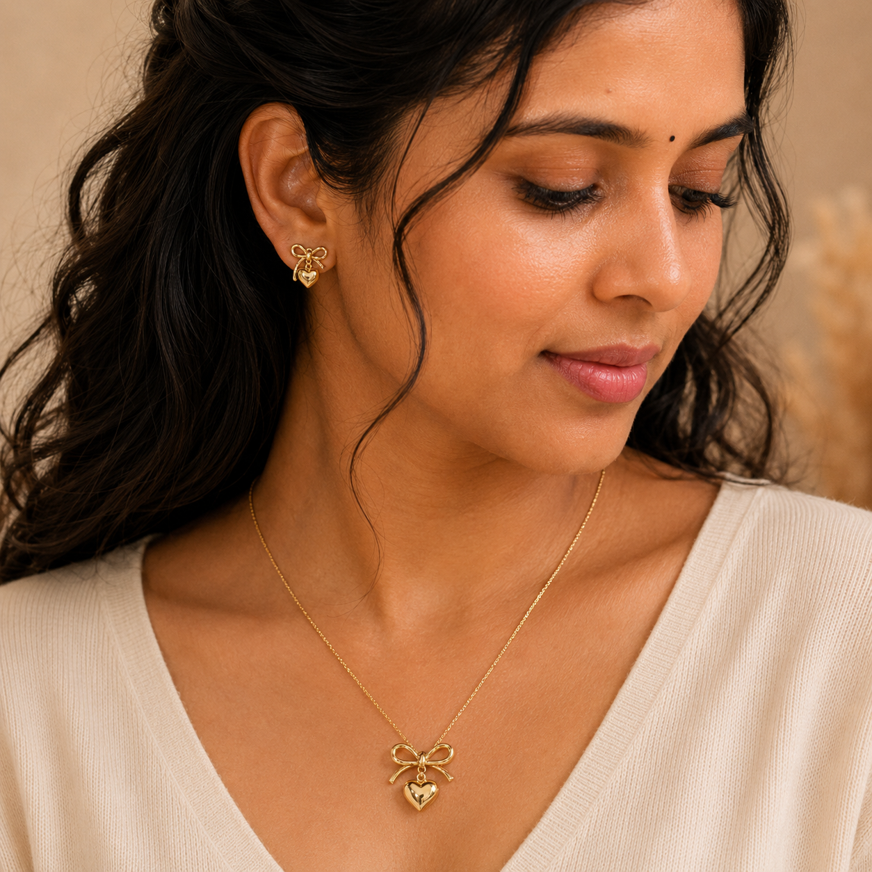 Thara Collections TA130 bow heart drop pendant earring combo jewellery set flat lay lifestyle image